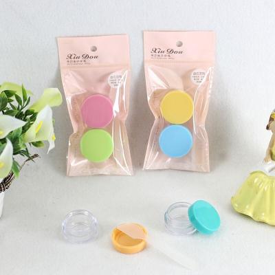 China Recyclable Amazon Top Selling 2pcs Portable Travel Plastic Jar Empty Cosmetic Cream Box for sale