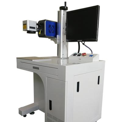 China Automated Loading CO2 Flying Laser Marking Machine Marking Plastic Products On Line Marking en venta