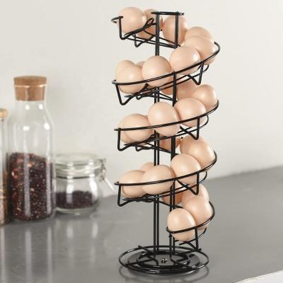 China Viable Design Stainless Steel Egg Skelter Dispenser Stand Holder Spiral Rack With Storage Basket for sale