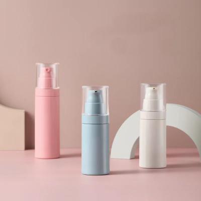 China 30ml 50ml cosmetic airless gray blue pink spray bottle plastic lotion container/cosmetic airless pump bottle with clear cap for sale