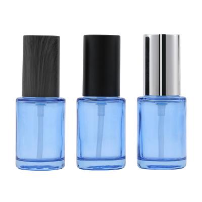 China Personal care wholesale 30ml lotion bottle /liquid base blue cosmetic glass bot with silver black wood grain lid for sale