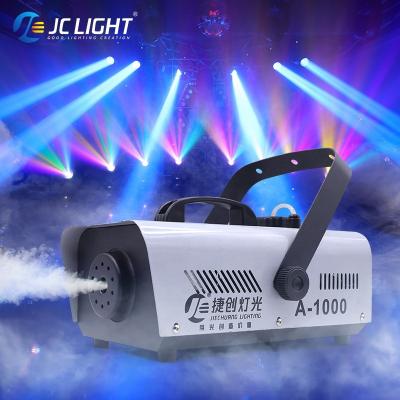 China Stages Small Portable 1000w Rgb Dmx 512 Control Smoke Fog Machine Stage Light for Wedding Party Stage Events for sale