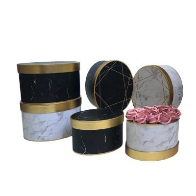 China Handmade Marble Pattern Process Packing Flower Box Party Flower Three-piece Oval Hot Stamping Gift Box for sale