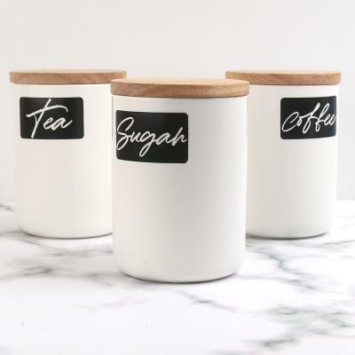 China Casual Wholesale Porcelain Food Storage Canister Ceramic Jar With Wooden Lid Set Of 3 for sale