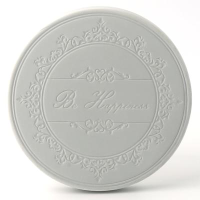 China Sustainable Personalized Customized Embossed Ceramic Design Sandstone Coasters for sale