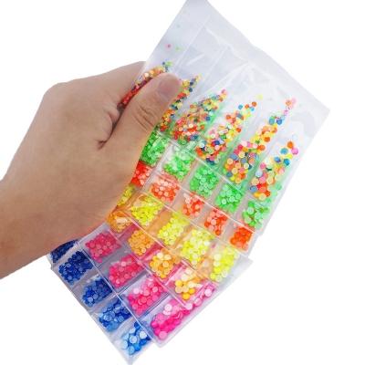 China Dark Nail Crystal Luminous Nail Art Rhinestone Glow In The Nail Art Crystals Wholesale Hot Sale Round Flatback Nail Art for sale