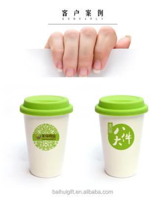 China Viable Simple Mug Promotion Ceramic Mug With Silicone Lids And Sleeve Wholesale for sale