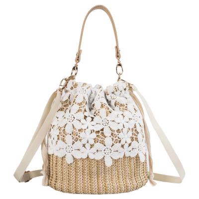 China Fashion China ladies lace up flowers sweet design drawstring straw bag reusable handbags for women for sale