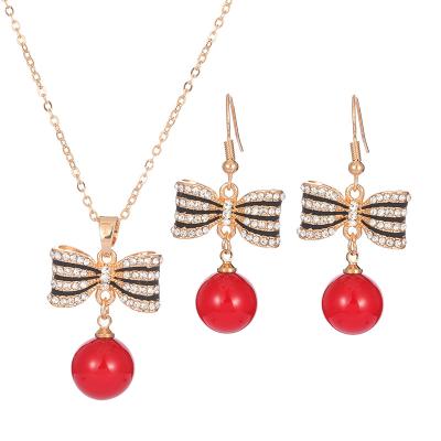 China Fashion CLASSIC Simple Temperament Imitation Pearl Jewelry Sets For Women Bowknot Temperament Pearl Earring Pendant Necklace Set for sale