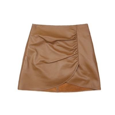 China Mini Skirt Young Lady Fashion Asymmetry Breathable Pleat Real Sheepskin One Line Genuine Leather Short Skirt for sale