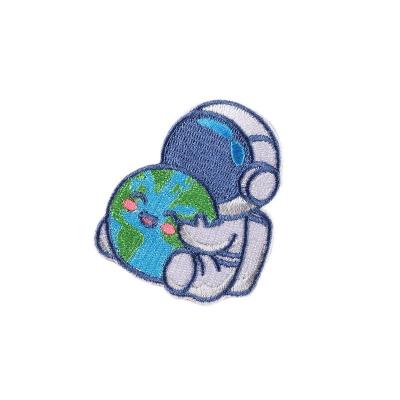 China Computer Washable Embroidered Patches Logo Planet Cartoon Astronaut Clothing Accessories Badge Embroidered Fabric Patch for sale