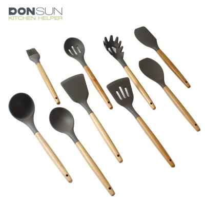 China Amazon Sustainable Kitchenware 9pcs Cooking Tools With Natural Wood Handle for sale