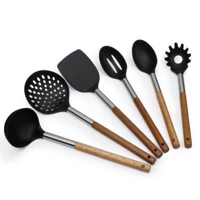 China Sustainable Cooking Sets Nylon Skimmer With Wooden Handle for sale