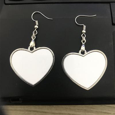 China Blank White 2 Side Blank , Sublimation Metal Empty Heart Shape Earring for sale