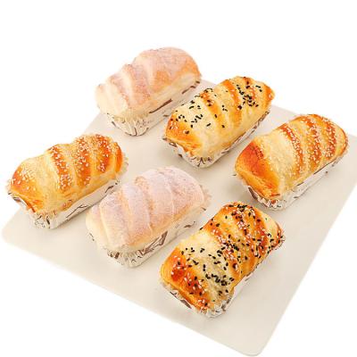 China Minimalist Amazon Success Pattern PU Window Display Photography Props Simulation Long Sesame Rolls for sale