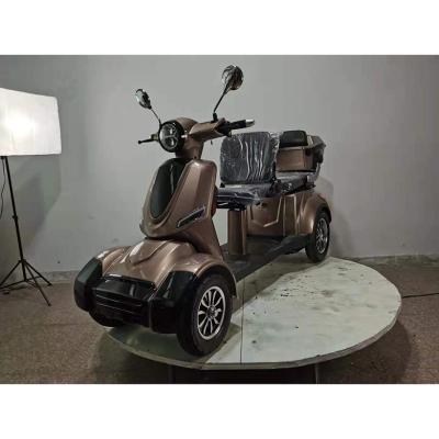 China Passenger Electric Mobility Scooters 4 Wheel Enclosed Stand Scooter 650W Stand On 4 Wheel for sale