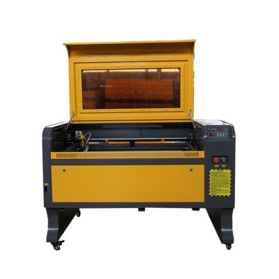 China Laser CUT 60W 80W 100W 9060 CO2 Wood Laser Engraving Cutting Machine For Nonmetal Cheap Price M2 Panel for sale