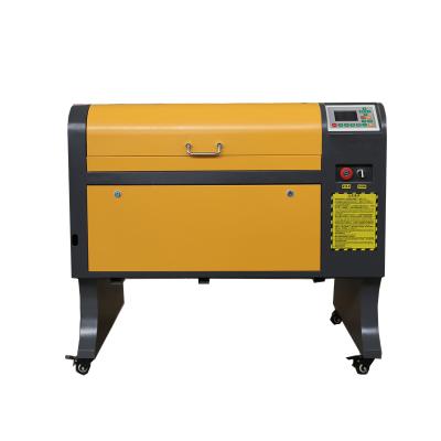 China Laser Engraving Rotary Laser Engraving Machine For Round Thing Glass China Acrylic Factory Discount Price 4060 for sale