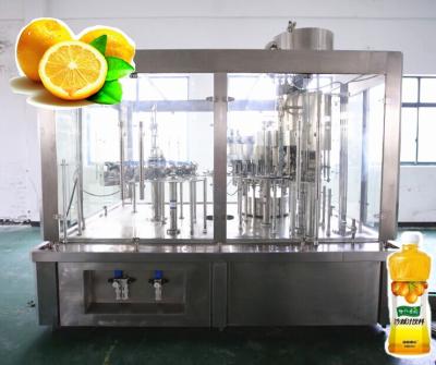 China Beverage China Juice Filling Machine Combines Rotating Washing, Filling And Covering for sale