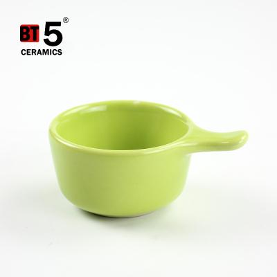 China Sustainable Creative Ceramic With Handle Round Seasoning Dish Small Japanese Style Salad Sauce Soy Dish for sale