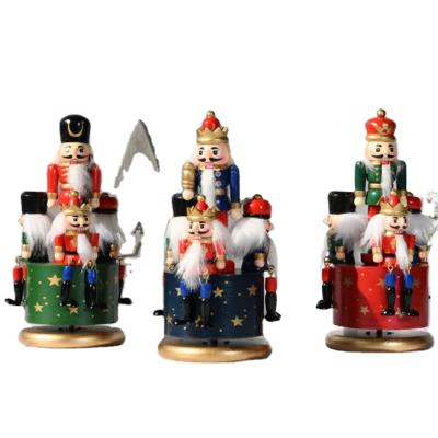 China Home Decoration Opens Christmas Ornament Handmade Wood Opens 23cm Rotating Nutcracker Music Box for sale