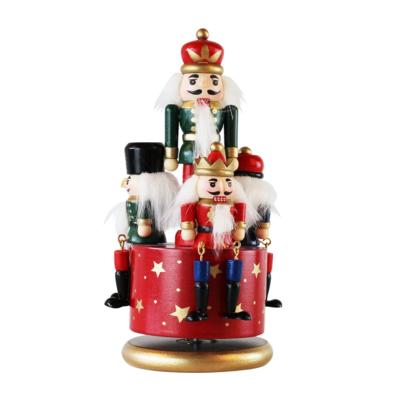 China Home Decoration Opens New Year's House Ornaments Wooden Doll Nutcracker Rotating Nutcracker Music Box for sale