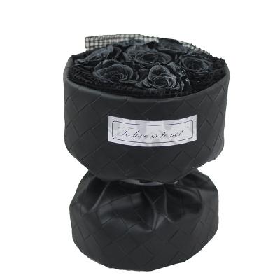 China Natural Fresh Rose Valentine's Day Luxury Gift 7 Roses Preserved Bouquet Wrapped in Black Leather with Woven Everlasting Immortal Pattern Flowers for sale