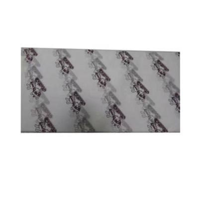 China Moisture Proof Custom Printed Logo Gift Wrapping Paper Packaging Paper for sale