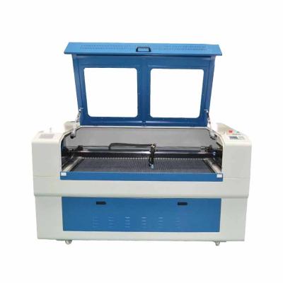 China Laser REDUCING ACUT 1390 1300x900mm 80w 100w 130w wood CO2 laser cutting machine laser engraving machine price for sale