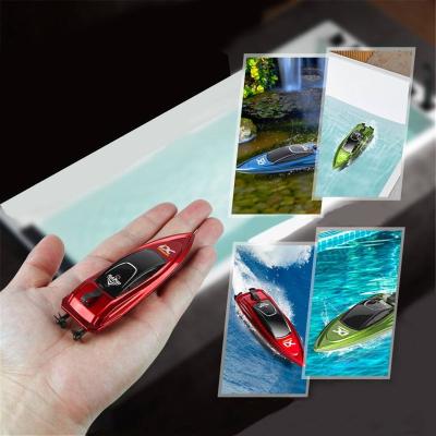 China Mini 5km/h RC Radio Controlled Boat App Remote Control High Speed ​​Boat with Water Toy Pool Toys Models Gifts LED Light Palm Boat Summer for sale