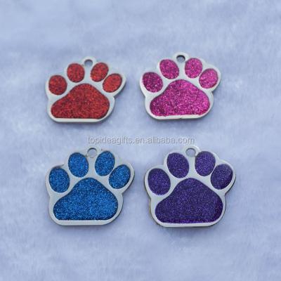 China Custom Engraved Europe Iron Paw Shaped Dog Tags With Transparent Epoxy Glitter for sale