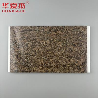 China Groothandel pvc-wandpaneel van steen met warm stempelen plafondpaneel pvc-huis interieur en exterieur decoratie Te koop