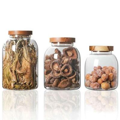 China Large Size Airtight Empty Freshness Preservation 1200ml 2000ml 2500ml Food Grade Jars Glass Bottles With Acacia Wood Cover for sale