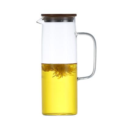 China Large Capacity 1L/1.2L/1.5L Borosilicate Carafe Heat Resistant Glass Stocked Juice Jugs For Graduation for sale