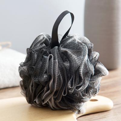 China EXFOLIATE Wholesale Charcoal Bath Ball Large Black White Edge PE Material Bamboo Bath Flower for sale