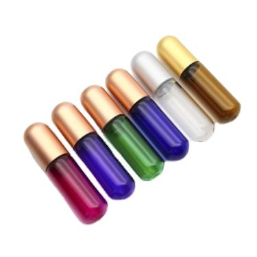 China Personal Care Amber Blue Green Pink Glass 5Ml Luxury Empty Capsule Shaped Perfume Essential Oil Roll On Ball Bottle Roll On Bottles for sale