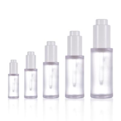 China Personal Care 20Ml 30Ml 50Ml 60Ml 100Ml Round Shape Push Button Pump Dropper High End Thick Bottom Glass Bottle Vial For Essential Oils for sale