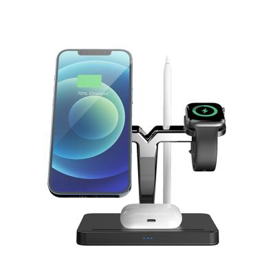 China Smart Watch All IN One 4 IN 1 Magnetic Fast Wireless Charger Suction Wireless Charging Stand For Iphone for sale