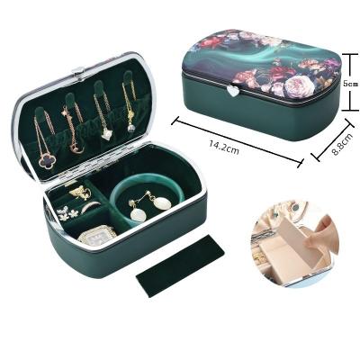 China PU Leather 2022 New Travel Portable Jewelry Box Earring Stud Ring Jewelry Storage Box for sale