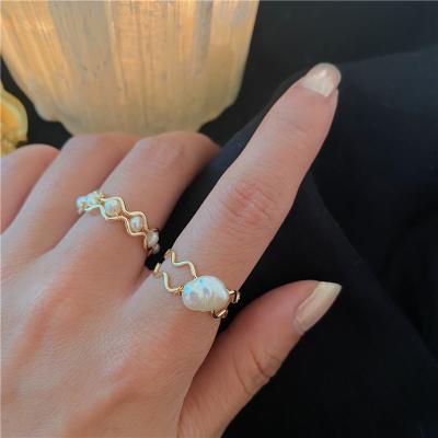 China 2022 New CLASSIC Women's Freshwater Baroque Pearl Rings Resizable Braided Rings for sale