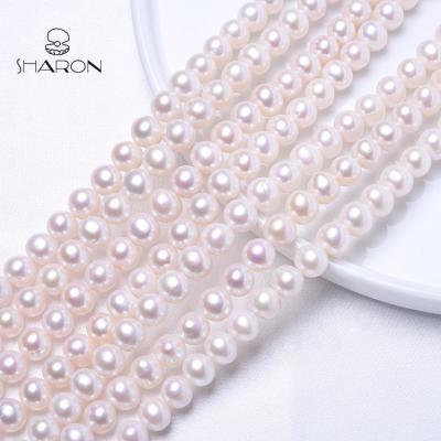 China Jewelry Making Bulk Near 10-11mm Round Pearl Strand White Natural Freshwater Pearls For Jewelry Making for sale