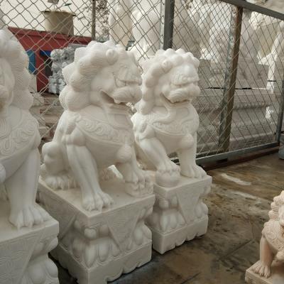 China Traditional Oriental Asian Foo Dog Statue Lion Statue Hand Carved White Marble Foo Dog Statues Sale for sale