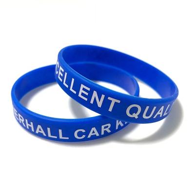 China Business Gift Design Mix New Colors Embossed Logo Silicone Wristband Custom Rubber Hand Wristband for sale