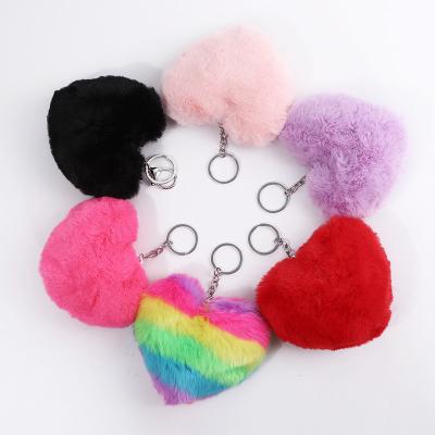 China Hot Selling Plushi Heart Shaped Cute Bag Ball Promotion Gift Hair Candy Color Pom Pom Keychains Dangling Plush Toy for sale