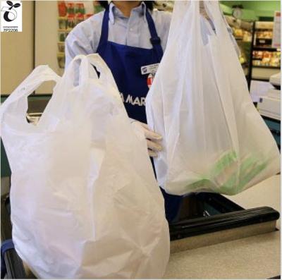 China 100% biodegradable supermarket shopping compostable vest bags/biodegradable plastic bag raw material yuca grocery bags for sale