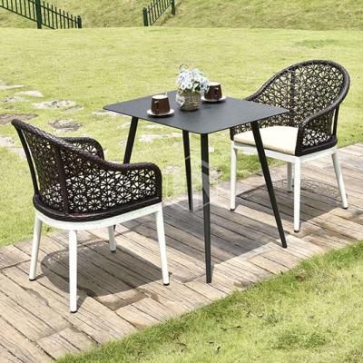 China Outdoor Modern Comfortable Weaver Rattan Chair Durable Dining Table Villa For Garden Furniture for sale