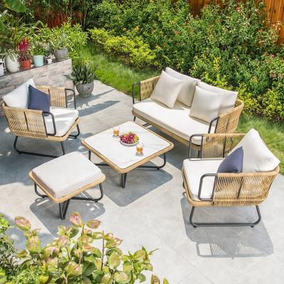 China Modern Nordic style modern outdoor table and chair set  rattan outdoor sofa set furniture garden chairs yard hotel Waterproof sofa set for sale