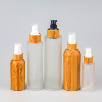 China Sealing Type 30ml 50ml 100ml 120ml 150ml Cosmetic Bamboo Spray Lotion Cream Use And Pump Cosmetic Bamboo Glass Bottle for sale