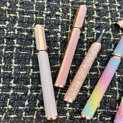 China Waterproof Self-adhesive Eyeliner Pen Purple Tube Lashglue Pen Eyeliner From China\t Private Label Eye-liner Cosmetic Eyeliner for sale