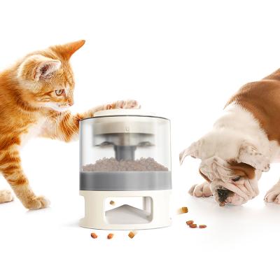 China Automatic Dog Cat Food Dispenser Container Toy Cat Dry Food Grain Automatic Plastic Dispenser with Button for sale